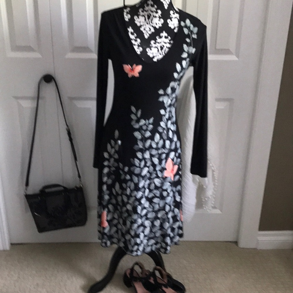 Gorgeous LBD with butterfly pattern.